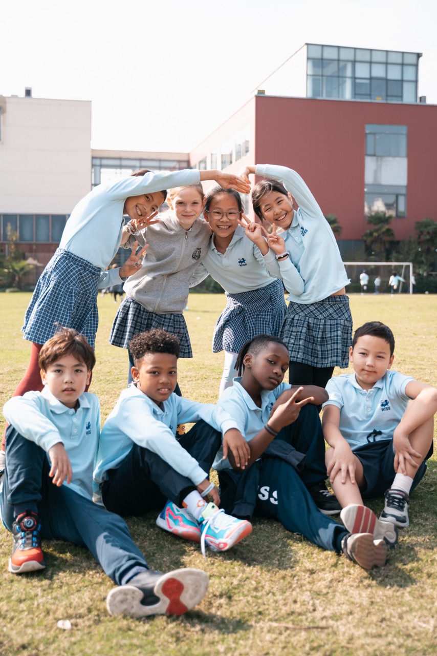WISS students smiling on campus